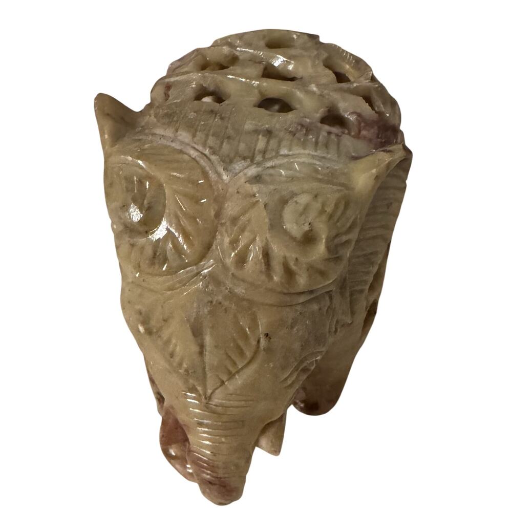 Vintage Jadeite elephant figurine, featuring a baby elephant inside